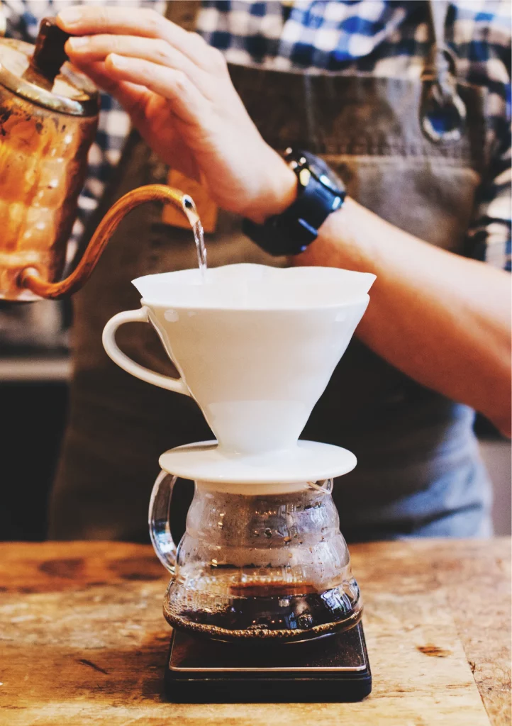 Percolation brewing illustrated by pour-over coffee method with flowing water