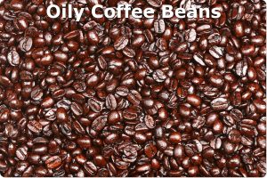 Dark roast coffee beans with visible oils